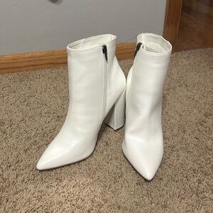 White heeled boots